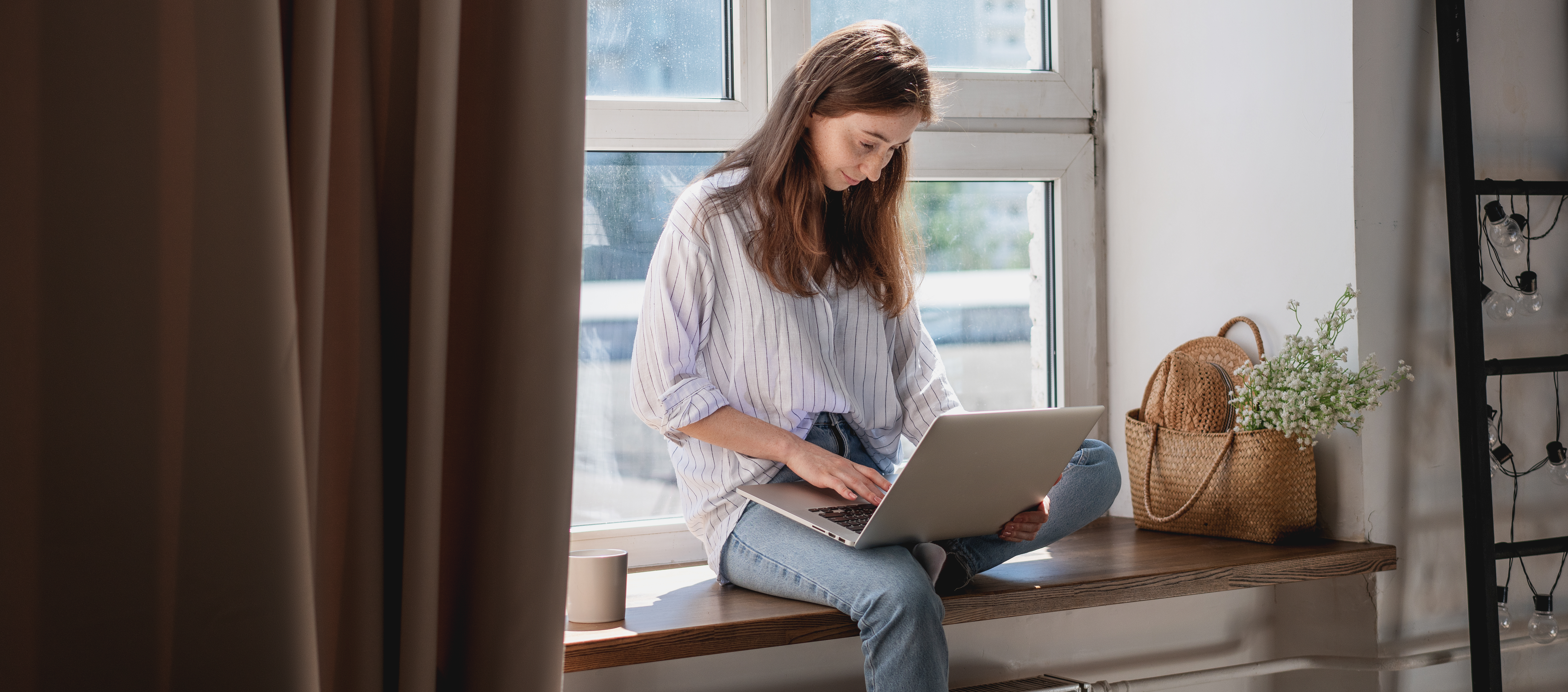 young woman business student working on computer