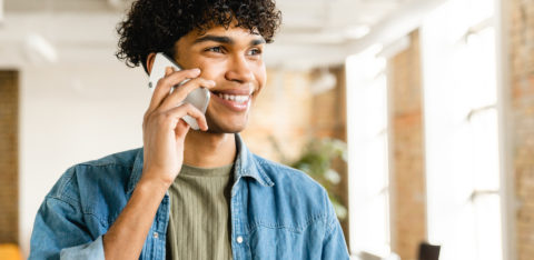 man on the phone talking to a debt consolidation company