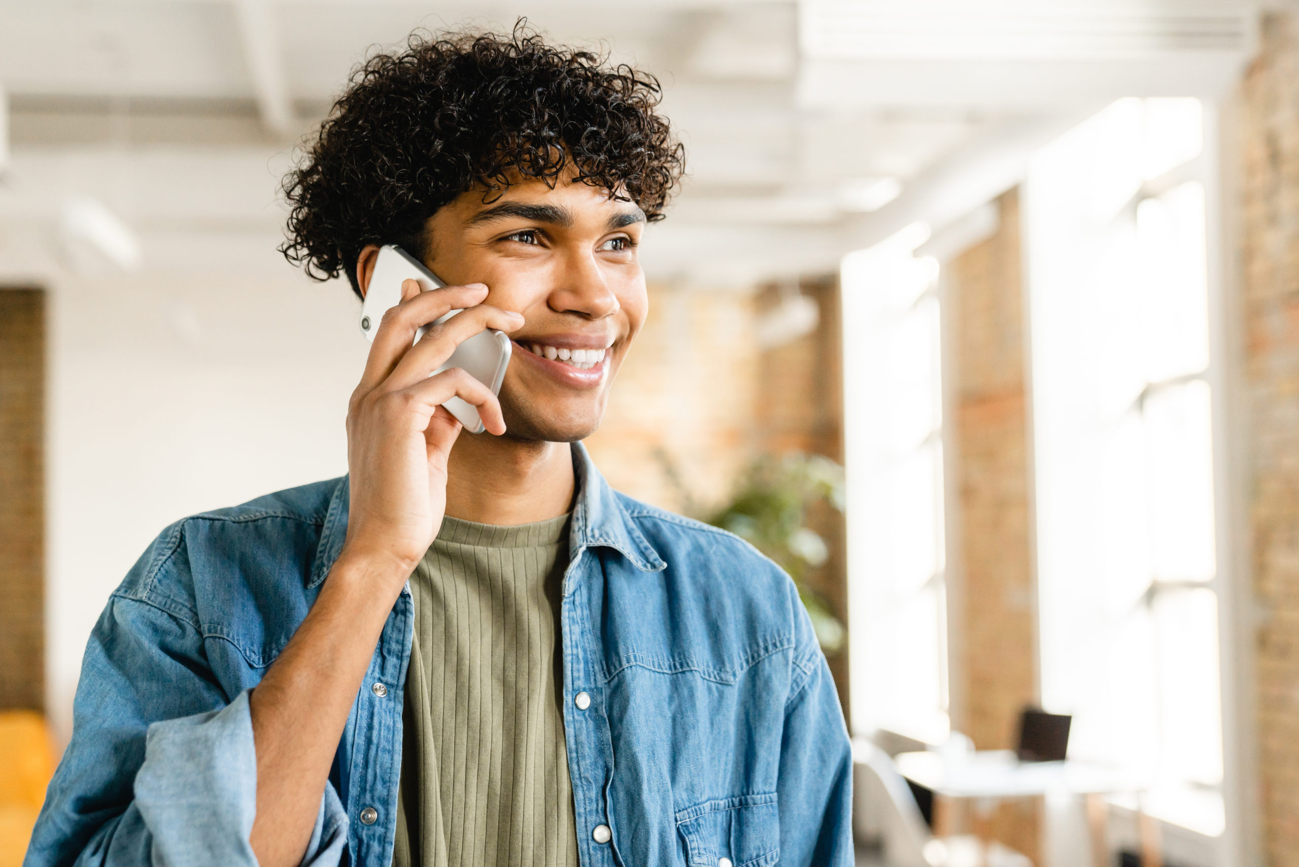 man on the phone talking to a debt consolidation company