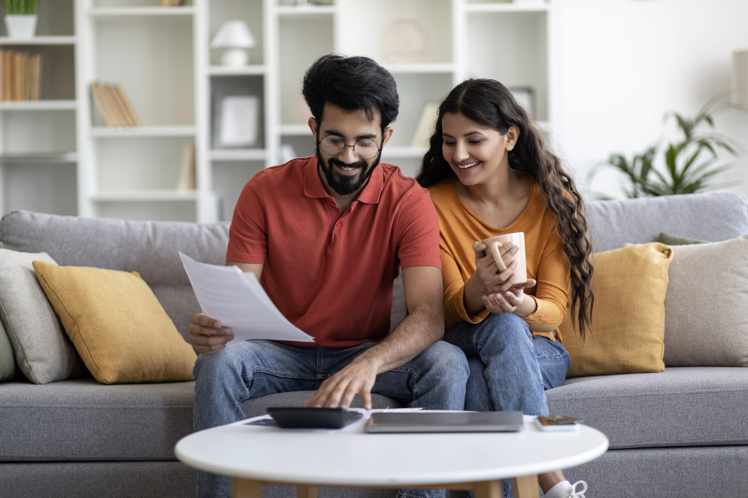 couple researching debt management plans