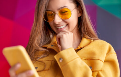 Cheerful woman researching payday loans