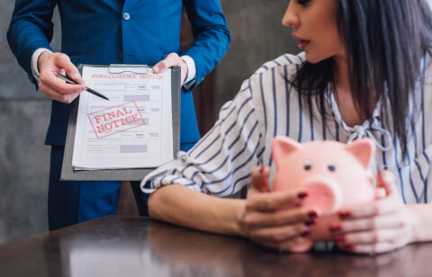 woman receiving a final notice from a debt collector