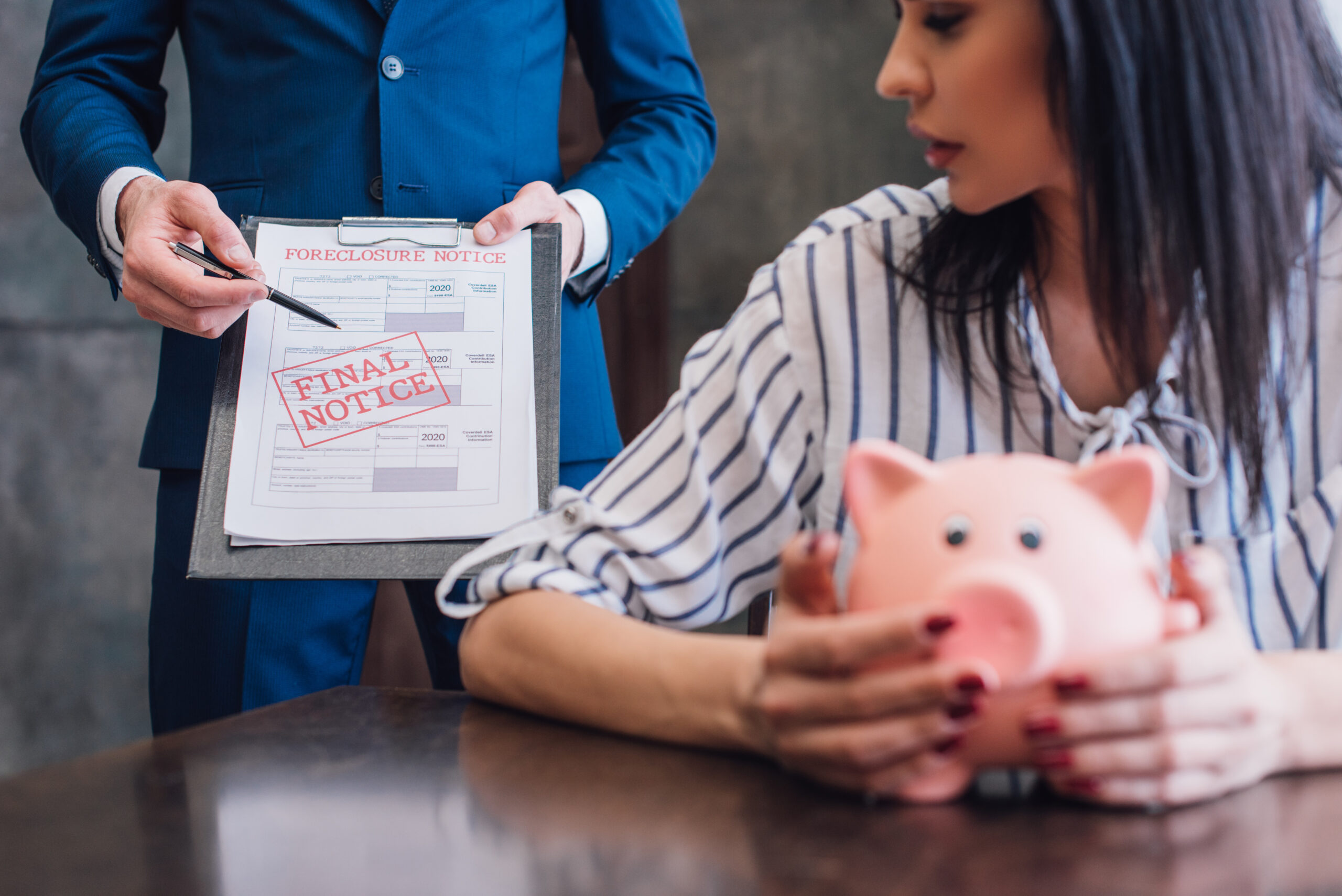 woman receiving a final notice from a debt collector