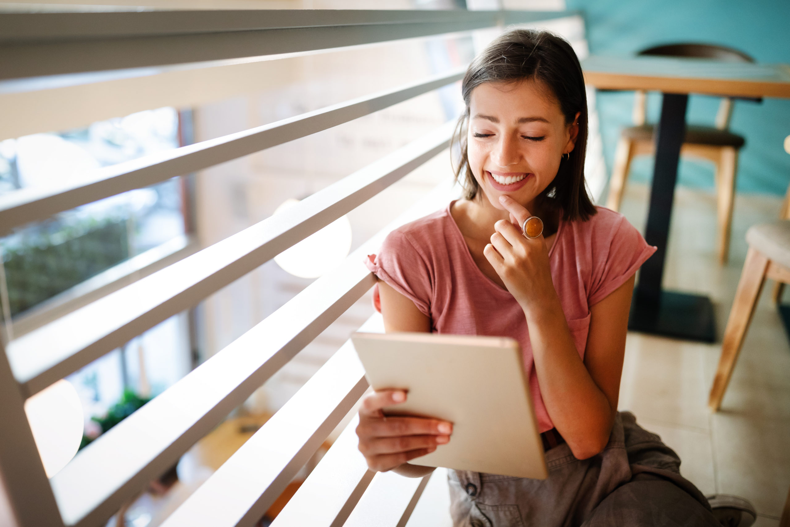 young woman making a budget to pay off debt