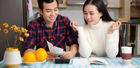 Couple managing household budget to be financially stable