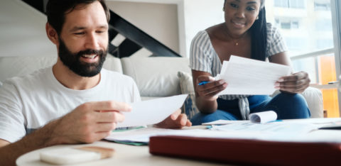 couple discussing managing multiple credit cards