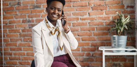 woman negotiating with a debt collection agency over the phone