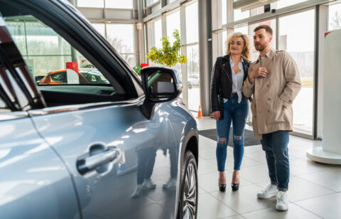 couple saving money on a car loan