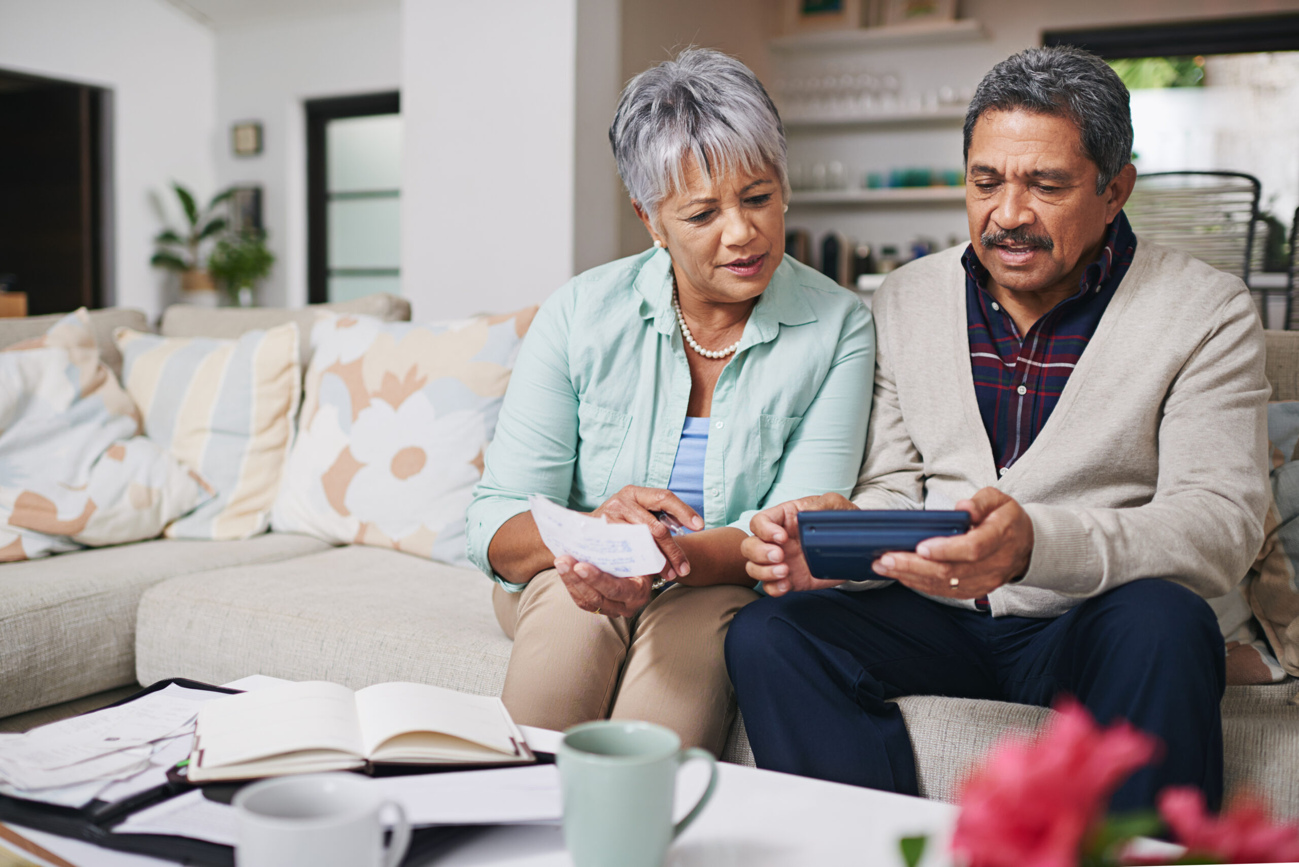 elderly couple managing money wisely