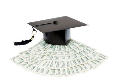 graduation cap with money