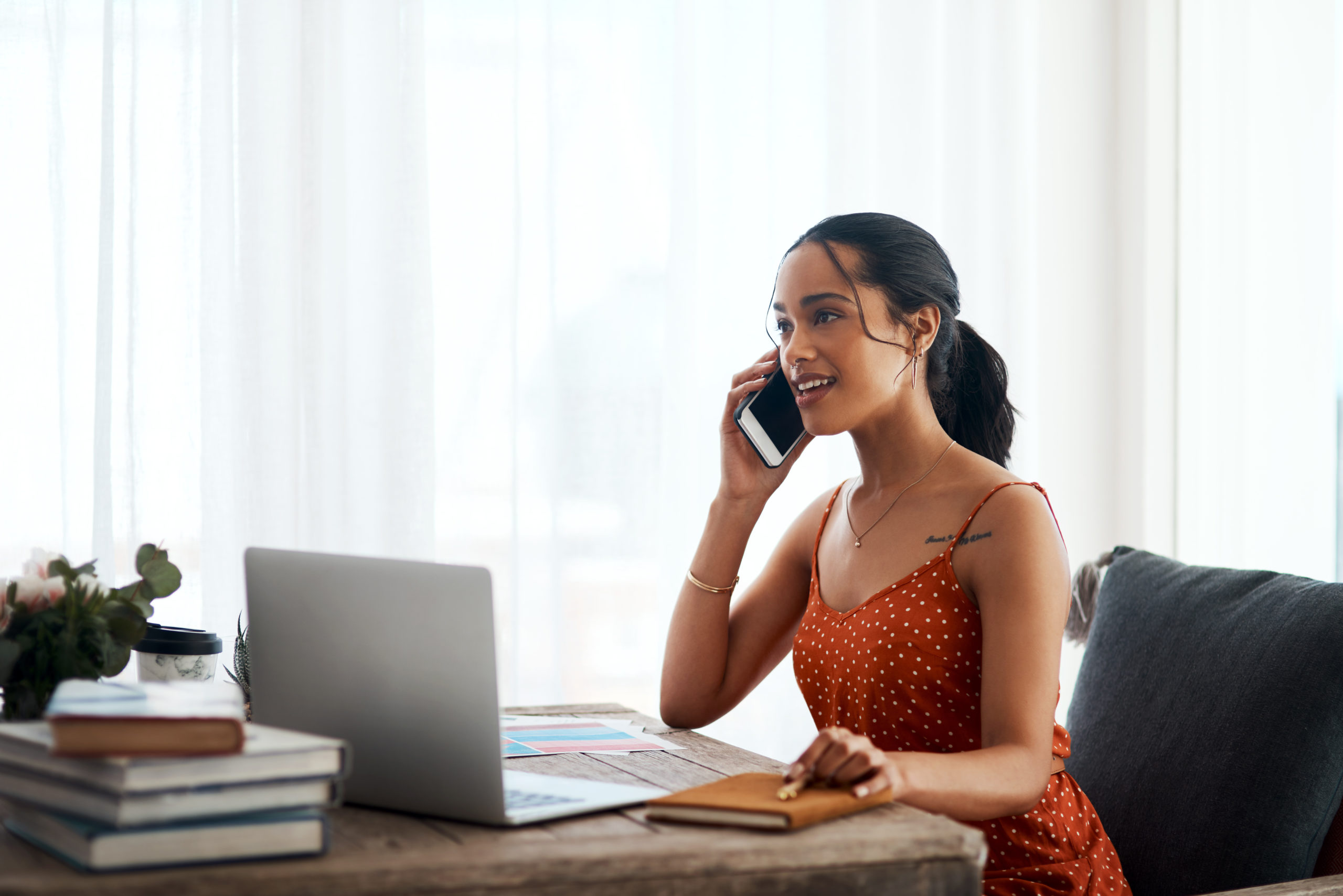 woman negotiating with creditors over the phone