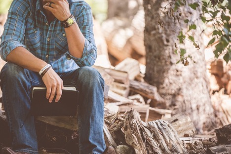 man thinking about how to increase credit score