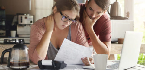 couple looking at paperwork