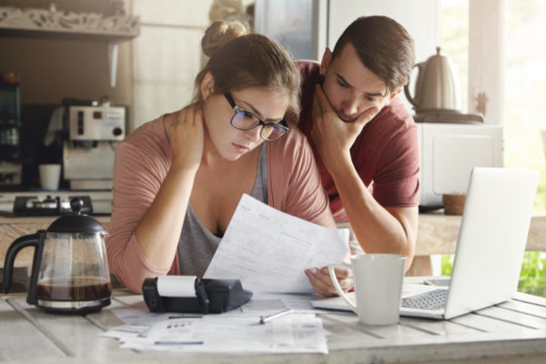 couple looking at paperwork