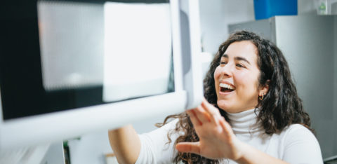 young woman making a microwave mug meal