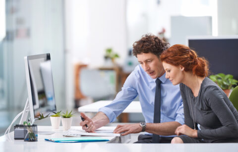 young business professionals discussing business loans