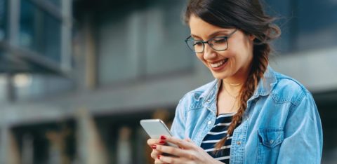 woman holding phone