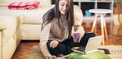 young woman researching student loans