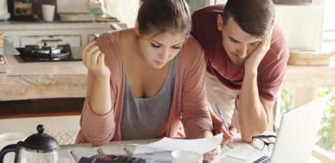 couple deciding between bankruptcy or credit counseling