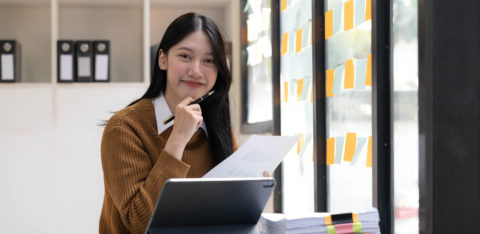 businesswoman filing taxes early