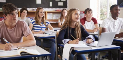 students in classroom learning about financial education