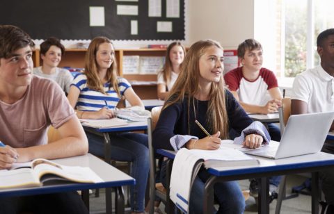 students in classroom learning about financial education