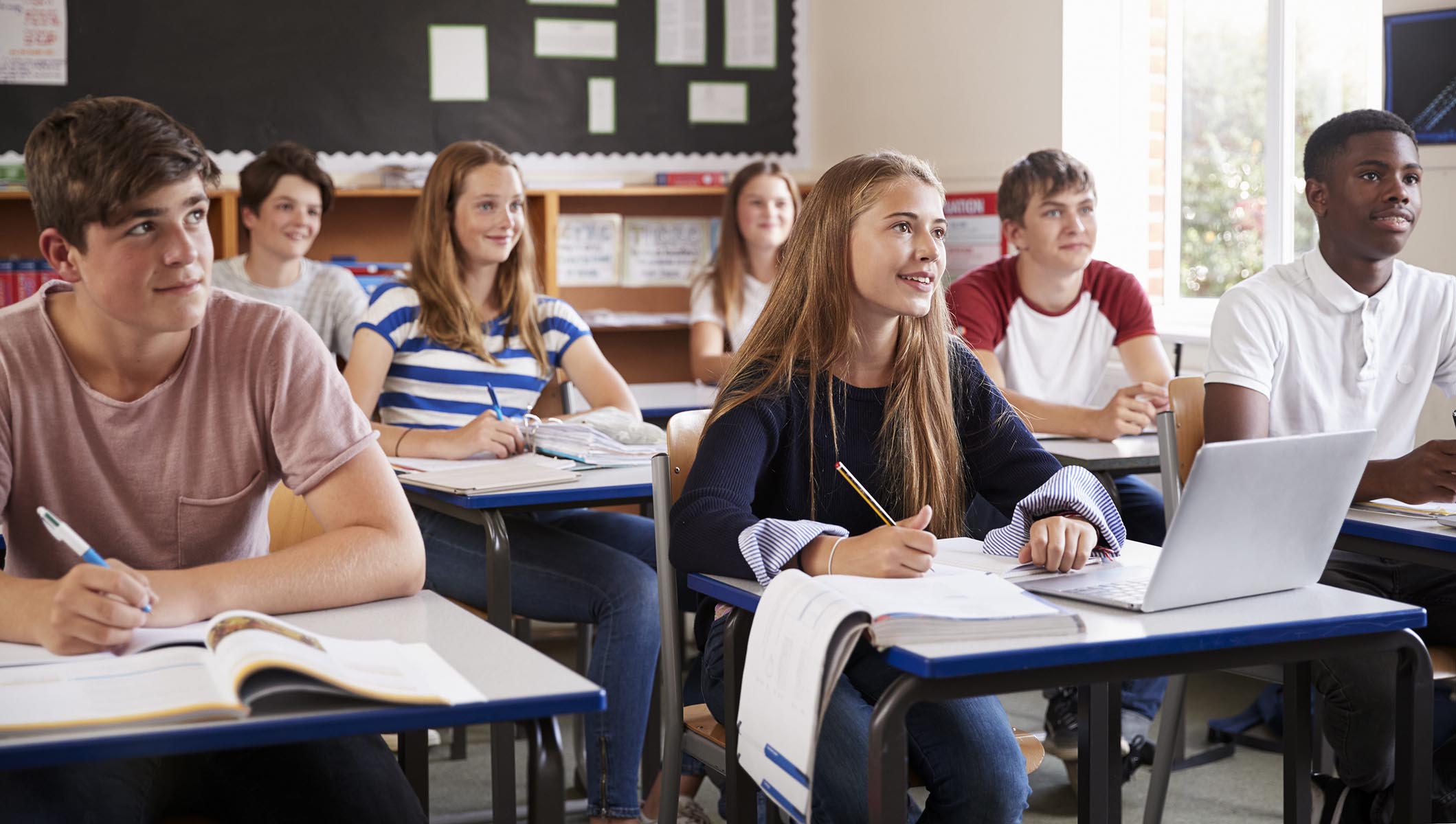 students in classroom learning about financial education