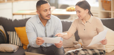 Family looking at their federal tax return