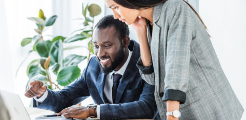 two people spotting a debt relief scam