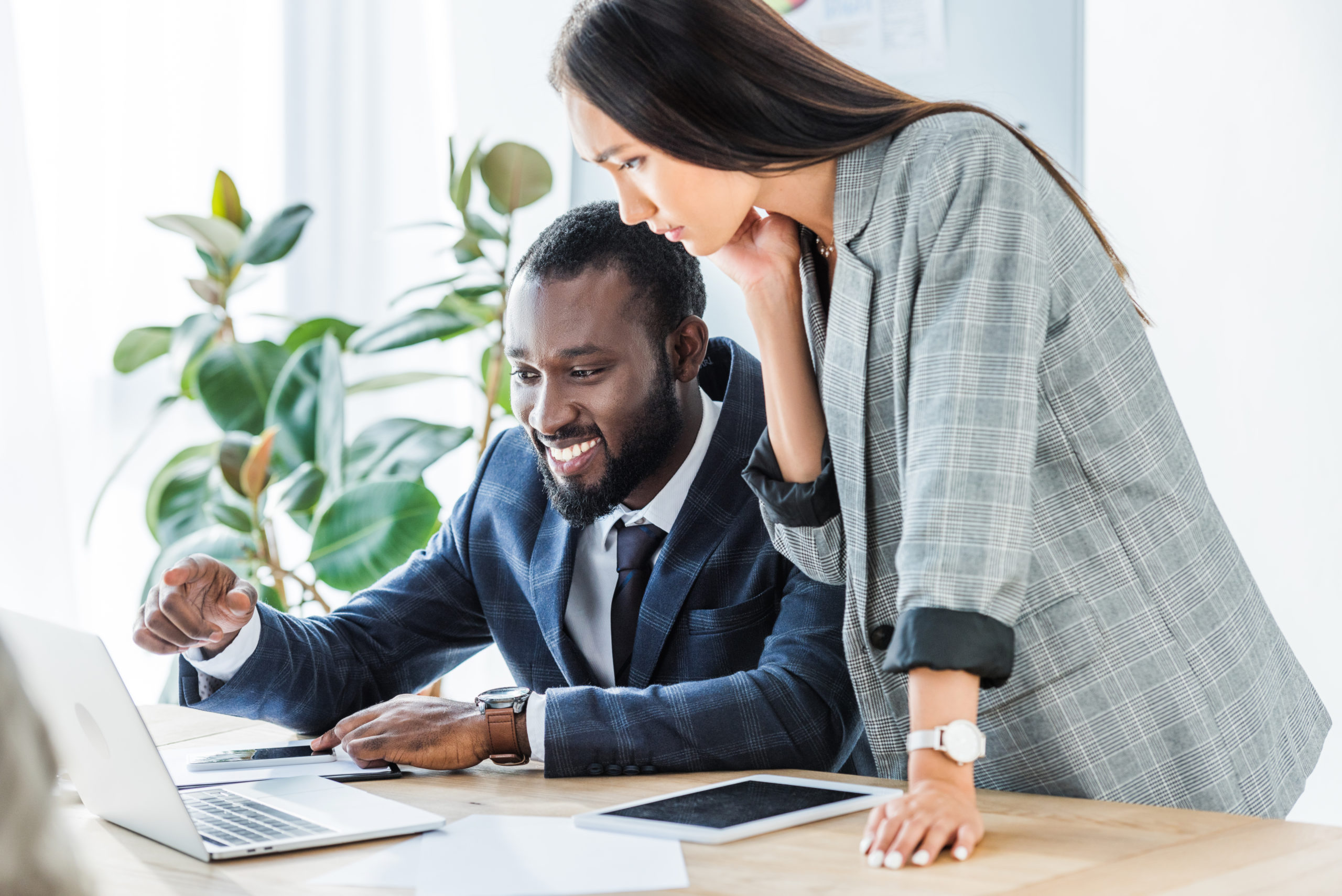 two people spotting a debt relief scam