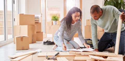 A couple making home modifications on their own to save money.