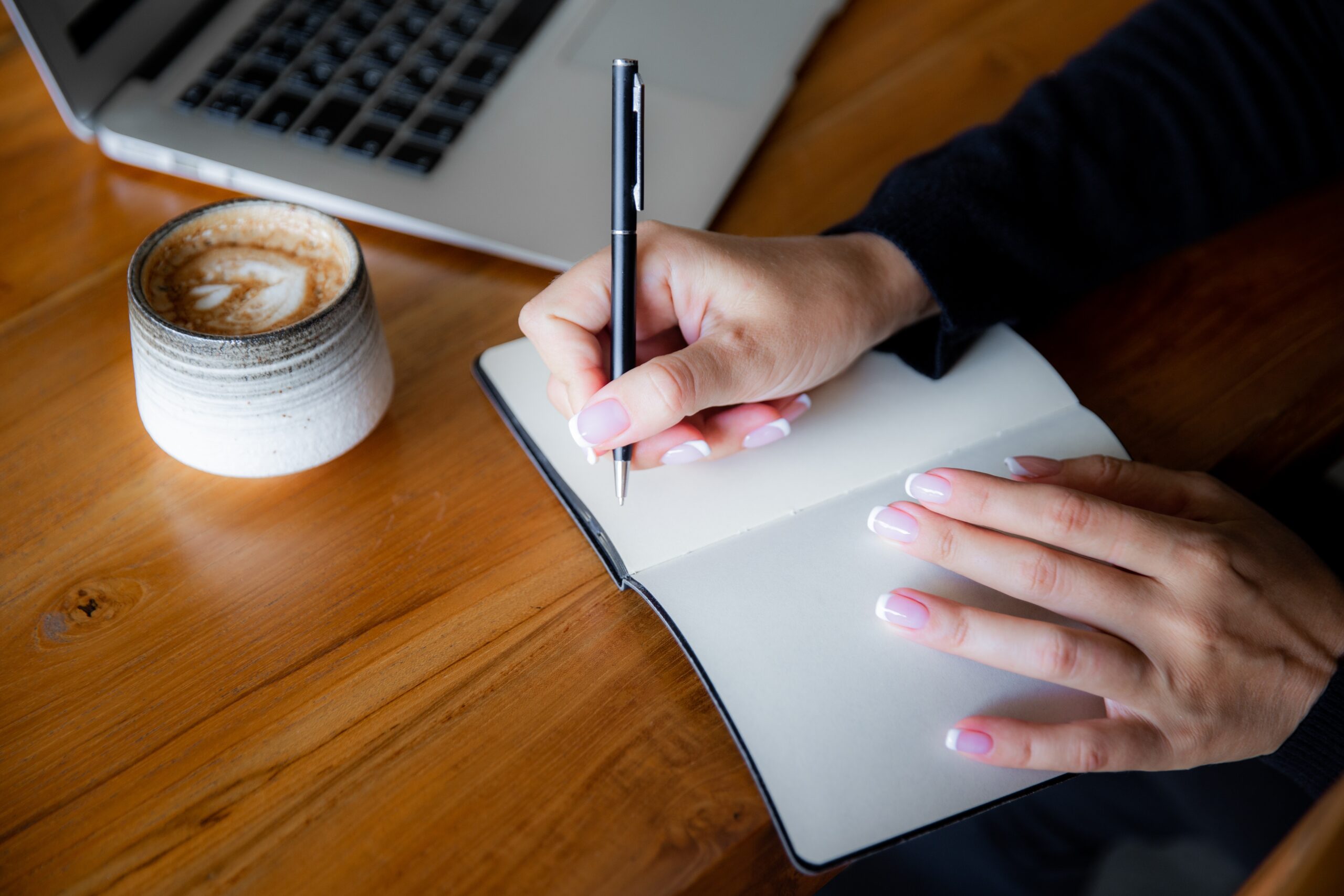 woman writing a list