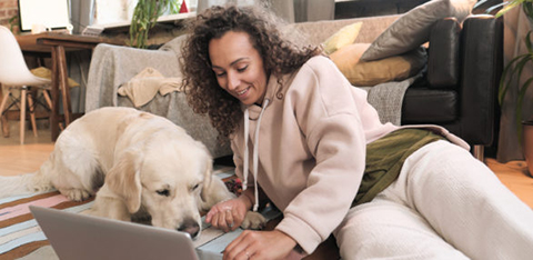 woman using laptop at home