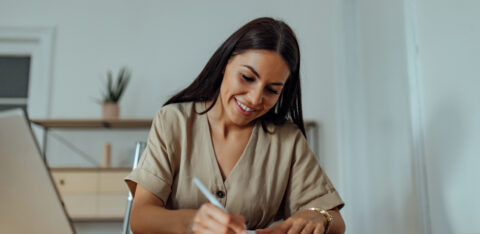 woman writing a list