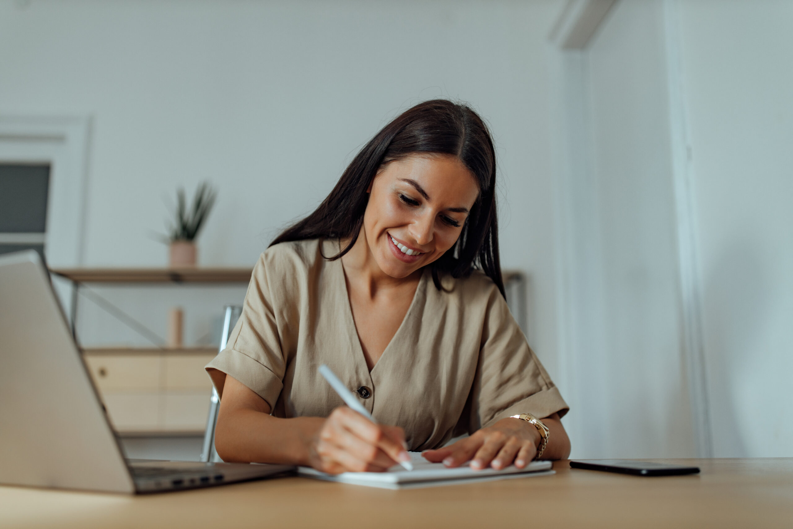 woman writing a list