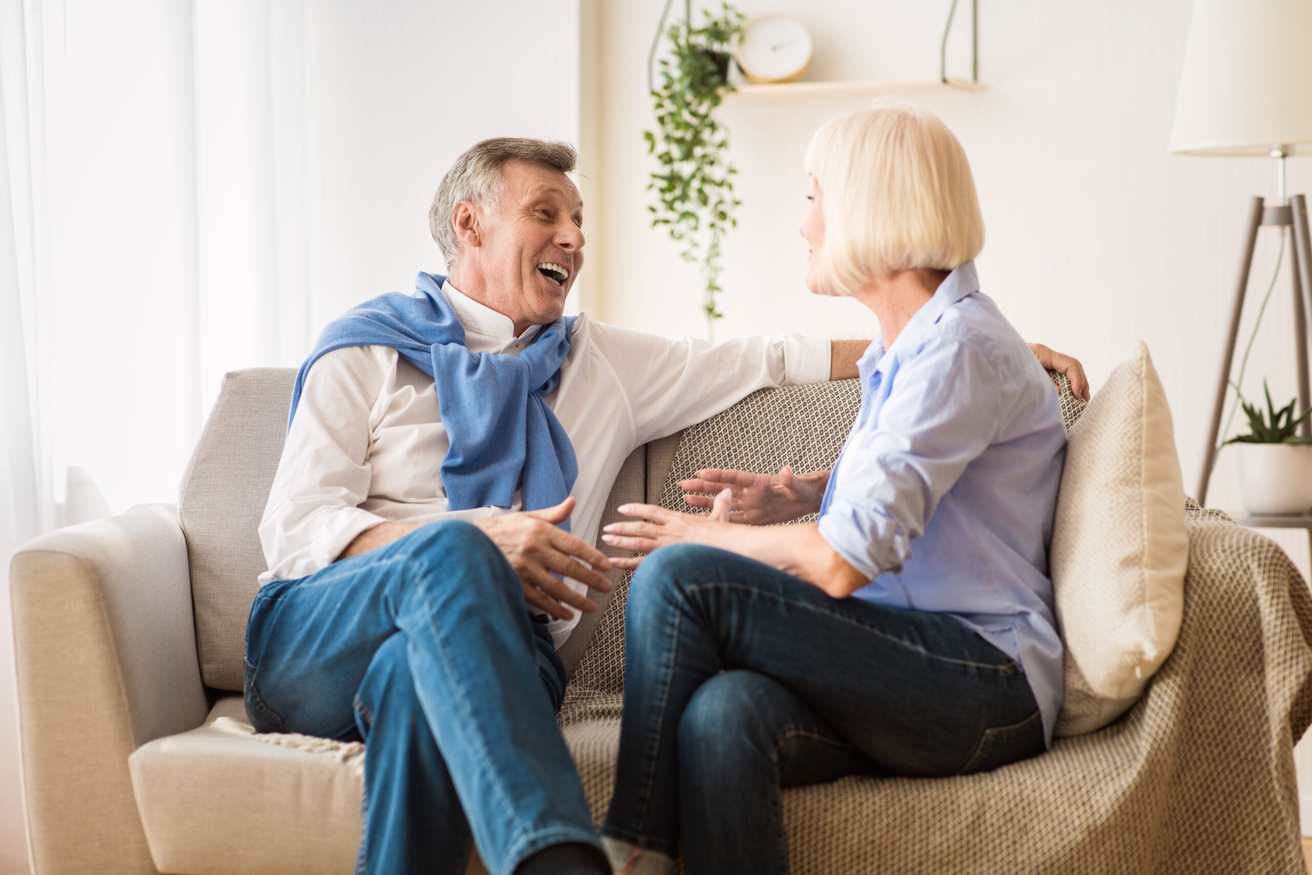 Retired couple discussing finances and debt