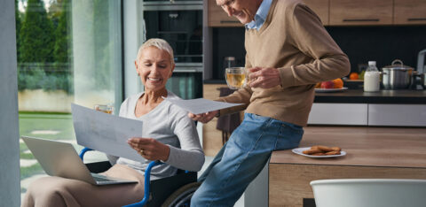 retired couple sorting through finances