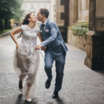 beautiful happy wedding couple smiling and kissing