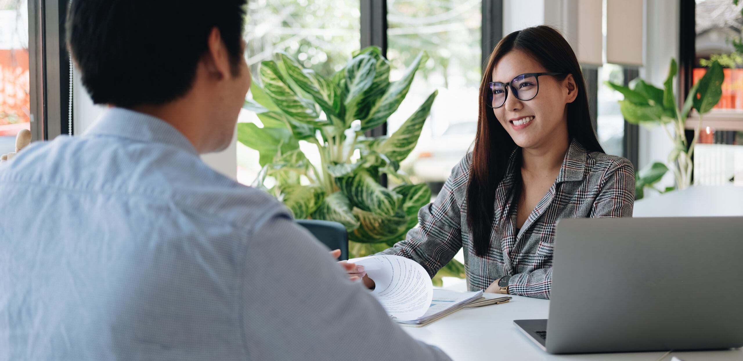 Employer or recruiter reading a resume during about colloquy his profile of candidate, employer conducting a job interview, manager resource employment and recruitment concept.