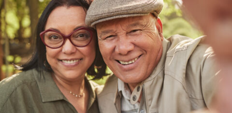 older couple taking a selfie