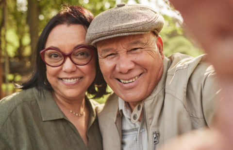 older couple taking a selfie