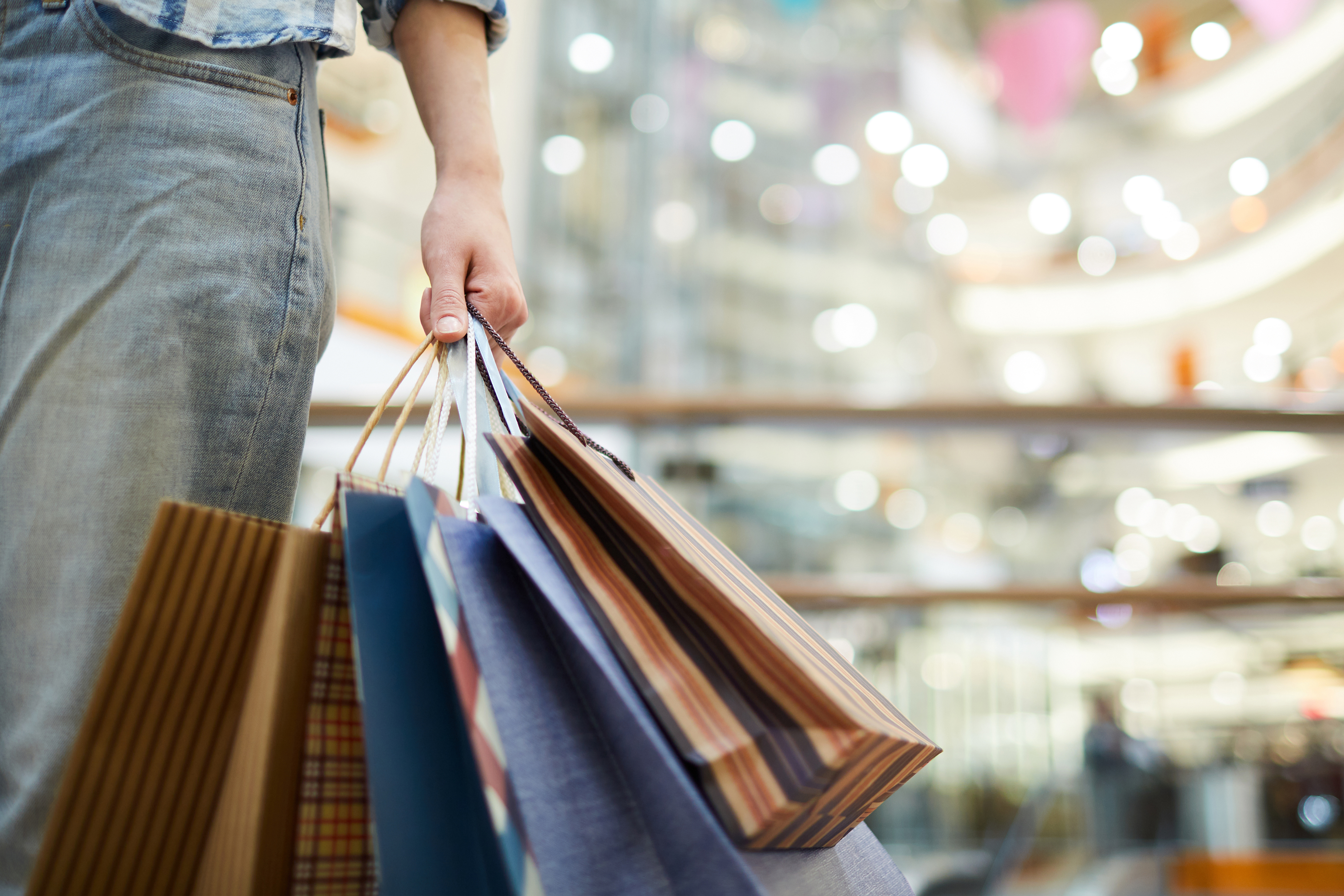 person with bags seasonal shopping